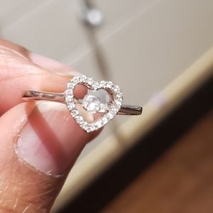Sterling silver heart shaped ring with cz stones. Size 7
